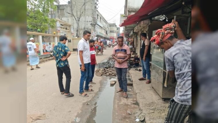 পাংশা বাজারের পানি নিস্কাশনে ড্রেন পরিস্কার অভিযান