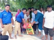 ভূরুঙ্গামারীতে বন্যায় ক্ষতিগ্রস্তদের মাঝে ১০ কেজি  জিআর চাল বিতরণ