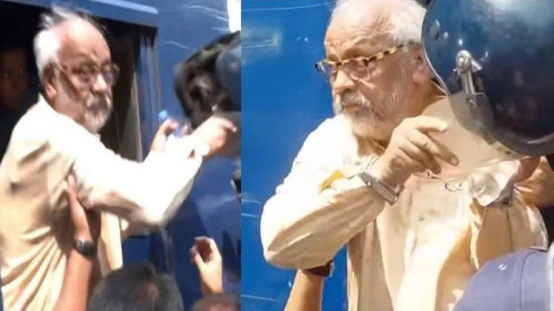 প্রিজনভ্যান থেকে নামার সময় হেলমেট ছুড়ে ফেললেন জামায়াত নেতা